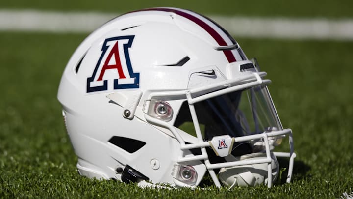 Nov 25, 2022; Tucson, Arizona, USA; Detailed view of an Arizona Wildcats helmet on the field during the Territorial Cup at Arizona Stadium. Mandatory Credit: Mark J. Rebilas-Imagn Images