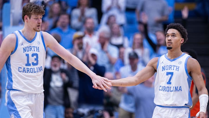 Mar 3, 2026; Chapel Hill, North Carolina, USA; North Carolina Tar Heels center Henri Veesaar (13) celebrates with guard Seth Trimble (7) during the second half against the Clemson Tigers at Dean E. Smith Center. Mandatory Credit: Scott Kinser-Imagn Images