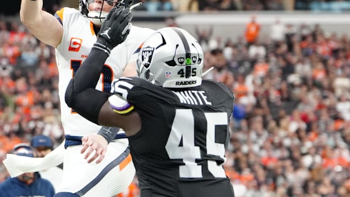 Dec 7, 2025; Paradise, Nevada, USA; Denver Broncos quarterback Bo Nix (10) throws the ball as Las Vegas Raiders linebacker Devin White (45) defends during the first half at Allegiant Stadium. Mandatory Credit: Stephen R. Sylvanie-Imagn Images Dec 7, 2025; Paradise, Nevada, USA; Denver Broncos quarterback Bo Nix (10) throws the ball as Las Vegas Raiders linebacker Devin White (45) defends during the first half at Allegiant Stadium. Mandatory Credit: Stephen R. Sylvanie-Imagn Images