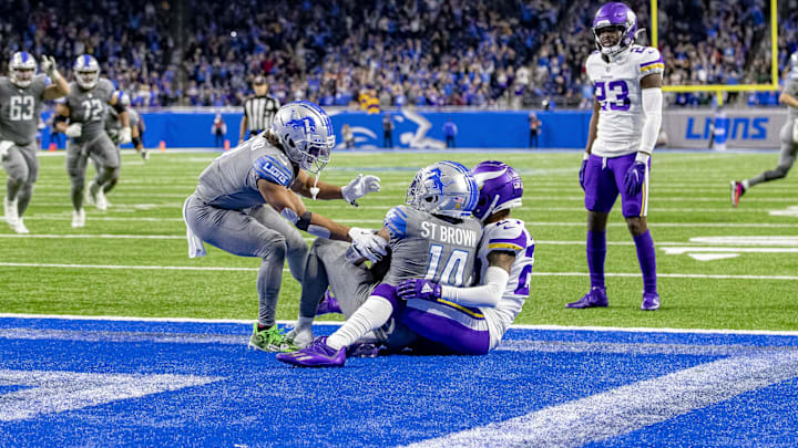 Detroit Lions wide receiver Amon-Ra St. Brown (14) catches the game winning touchdown against Vikings 