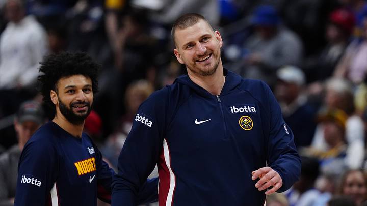Mar 22, 2026; Denver, Colorado, USA; Denver Nuggets center Nikola Jokic (15) and guard Jamal Murray (27) react before the game against the Portland Trail Blazers at Ball Arena. Mar 22, 2026; Denver, Colorado, USA; Denver Nuggets center Nikola Jokic (15) and guard Jamal Murray (27) react before the game against the Portland Trail Blazers at Ball Arena.