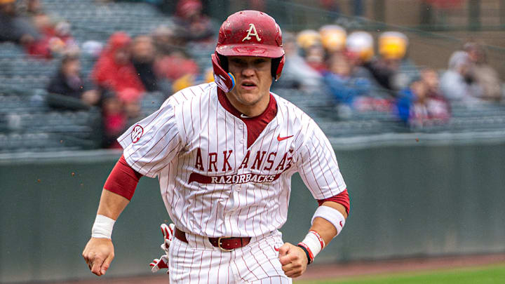 Cam Kozeal runs the bases in the series opener against Mizzou. The Razorbacks won 21-3 Cam Kozeal runs the bases in the series opener against Mizzou. The Razorbacks won 21-3