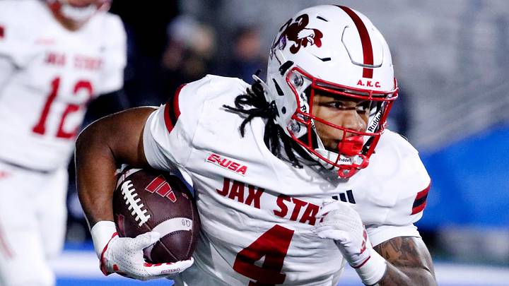 Jacksonville State running back Cam Cook (4) carries the ball during the football game against Middle Tennessee, at MTSU on Wednesday, October 29, 2025.