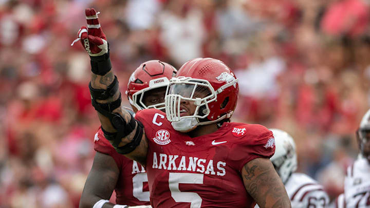 Arkansas' Cam Ball celebrates after a play against Alabama A&M during the Razorbacks' season opener inside Razorback Stadium. The Razorbacks won 52-7. 
