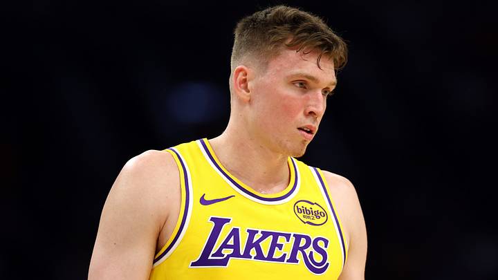 Oct 14, 2025; Phoenix, Arizona, USA; Los Angeles Lakers guard Dalton Knecht (4) against the Phoenix Suns during an NBA preseason game at Mortgage Matchup Center. Mandatory Credit: Mark J. Rebilas-Imagn Images Oct 14, 2025; Phoenix, Arizona, USA; Los Angeles Lakers guard Dalton Knecht (4) against the Phoenix Suns during an NBA preseason game at Mortgage Matchup Center. Mandatory Credit: Mark J. Rebilas-Imagn Images