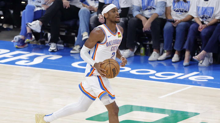 May 20, 2025; Oklahoma City, Oklahoma, USA; Oklahoma City Thunder guard Shai Gilgeous-Alexander (2) dribbles against the Minnesota Timberwolves in the first quarter during game one of the western conference finals for the 2025 NBA Playoffs at Paycom Center. Mandatory Credit: Alonzo Adams-Imagn Images