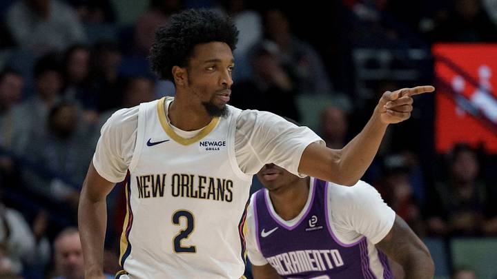 Feb 9, 2026; New Orleans, Louisiana, USA; New Orleans Pelicans forward Herbert Jones (2) reacts after a basket against Sacramento Kings guard Daeqwon Plowden (29) during the first half at Smoothie King Center. Mandatory Credit: Matthew Hinton-Imagn Images