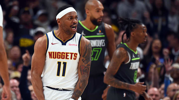 Apr 18, 2026; Denver, Colorado, USA; Denver Nuggets guard Bruce Brown (11) reacts after a basket and foul during the first half against the Minnesota Timberwolves in game one of the first round of the 2026 NBA Playoffs at Ball Arena. Mandatory Credit: Christopher Hanewinckel-Imagn Images