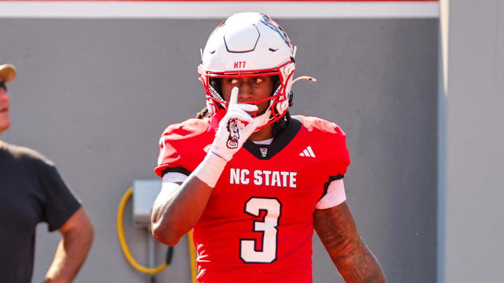 NC State Wolfpack running back Hollywood Smothers (3) celebrates a touchdown during the first half against the Campbell Fighting Camels at Carter-Finley Stadium.