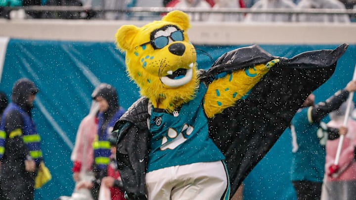 Dec 7, 2025; Jacksonville, Florida, USA;Jacksonville Jaguars mascot Jaxson de Ville walks on the field in the rain during pregame at EverBank Stadium. Mandatory Credit: Travis Register-Imagn Images