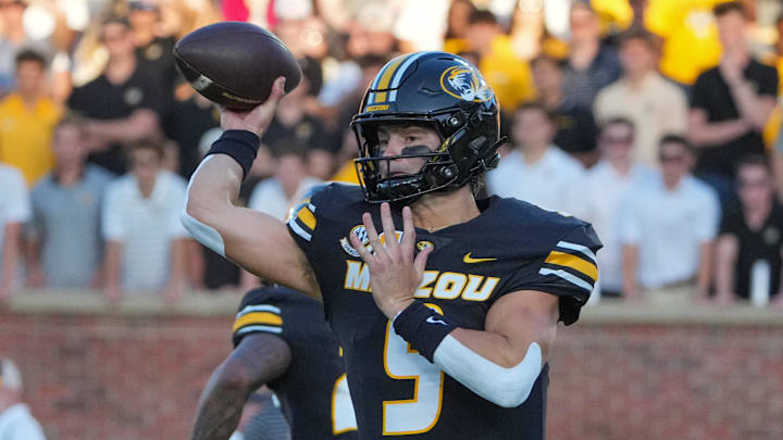 Aug 28, 2025; Columbia, Missouri, USA; Missouri Tigers quarterback Beau Pribula (9) throws a pass against the Central Arkansas Bears during the first half of the game at Faurot Field at Memorial Stadium. Mandatory Credit: Denny Medley-Imagn Images Aug 28, 2025; Columbia, Missouri, USA; Missouri Tigers quarterback Beau Pribula (9) throws a pass against the Central Arkansas Bears during the first half of the game at Faurot Field at Memorial Stadium. Mandatory Credit: Denny Medley-Imagn Images