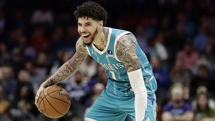 Mar 19, 2026; Charlotte, North Carolina, USA; Charlotte Hornets guard LaMelo Ball (1) smiles as he dribbles the ball during the first quarter against the Orlando Magic at Spectrum Center. Mandatory Credit: Brian Westerholt-Imagn Images