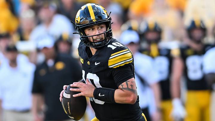 Sep 5, 2026; Iowa City, Iowa, USA;  Iowa Hawkeyes quarterback Jeremy Hecklinski (10) looks to make a pass against the Northern Illinois Huskies during the third quarter at Kinnick Stadium.  Mandatory Credit: Jeffrey Becker-Imagn Images
