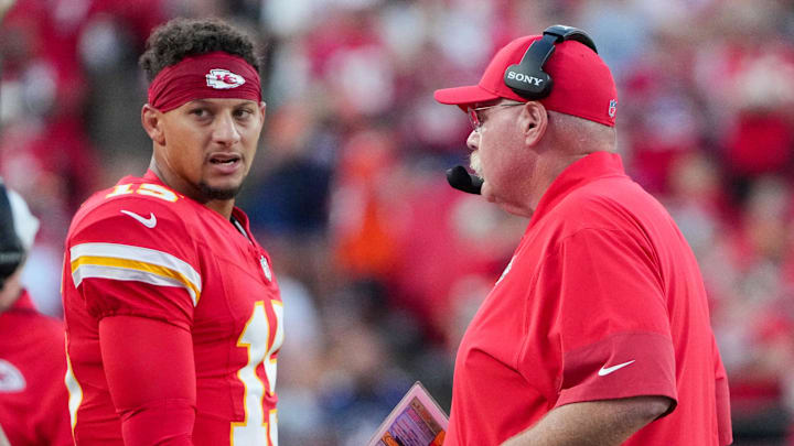 Aug 22, 2025; Kansas City, Missouri, USA; Kansas City Chiefs quarterback Patrick Mahomes (15) talks with head coach Andy Reid after a play against the Chicago Bears during the first half of the game at GEHA Field at Arrowhead Stadium. Mandatory Credit: Denny Medley-Imagn Images