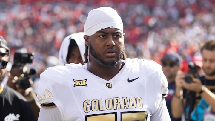 Oct 19, 2024; Tucson, Arizona, USA; Colorado Buffalos offensive tackle Jordan Seaton (77) against the Arizona Wildcats at Arizona Stadium. Mandatory Credit: Mark J. Rebilas-Imagn Images