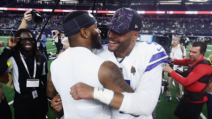 Dallas Cowboys quarterback Dak Prescott and Green Bay Packers defensive end Micah Parsons embrace after the game.