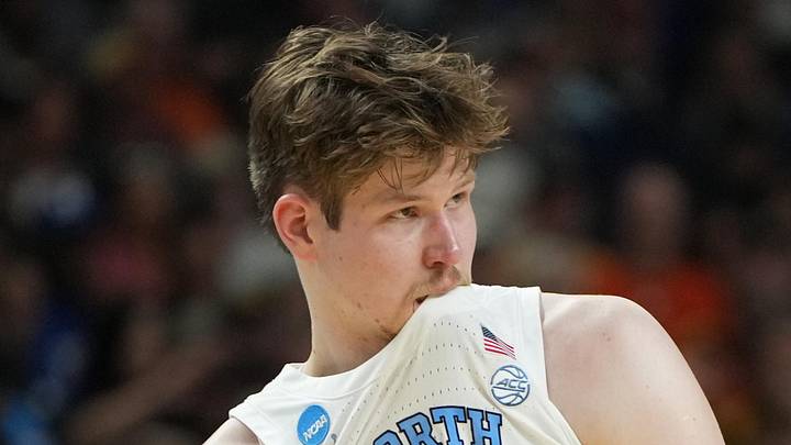 Mar 19, 2026; Greenville, SC, USA; North Carolina Tar Heels center Henri Veesaar (13) bites his jersey against the VCU Rams in the second half of a first round game of the men's 2026 NCAA Tournament at Bon Secours Wellness Arena. Mandatory Credit: Bob Donnan-Imagn Images