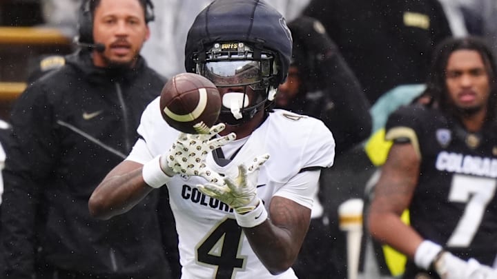 Apr 27, 2024; Boulder, CO, USA; Colorado Buffaloes wide receiver Omarion Miller (4) prepares to catch the ball during a spring game event at Folsom Field. Mandatory Credit: Ron Chenoy-Imagn Images Apr 27, 2024; Boulder, CO, USA; Colorado Buffaloes wide receiver Omarion Miller (4) prepares to catch the ball during a spring game event at Folsom Field. Mandatory Credit: Ron Chenoy-Imagn Images