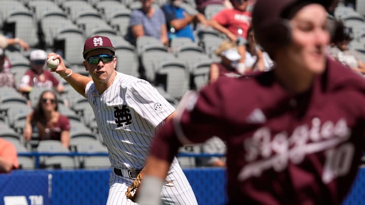 Mississippi State third baseman Ace Reese (3) fields a bunt by Texas A&M second baseman Ben Royo (10) but makes a wild throw to first in the first round of the SEC Baseball Tournament at the Hoover Met. Mississippi State third baseman Ace Reese (3) fields a bunt by Texas A&M second baseman Ben Royo (10) but makes a wild throw to first in the first round of the SEC Baseball Tournament at the Hoover Met.