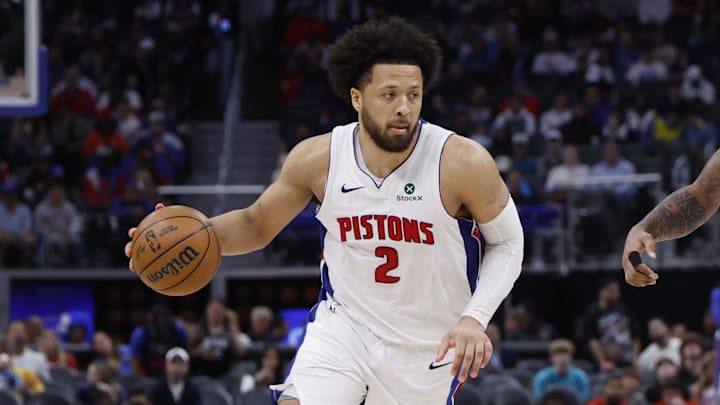May 3, 2026; Detroit, Michigan, USA; Detroit Pistons guard Cade Cunningham (2) dribbles defended by Orlando Magic forward Paolo Banchero (5) in the second half during game seven of the first round of the 2026 NBA Playoffs at Little Caesars Arena. Mandatory Credit: Rick Osentoski-Imagn Images