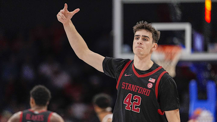 Mar 13, 2025; Charlotte, NC, USA; Stanford Cardinal forward Maxime Raynaud (42) after a dunk against the Louisville Cardinals during the second half at Spectrum Center.