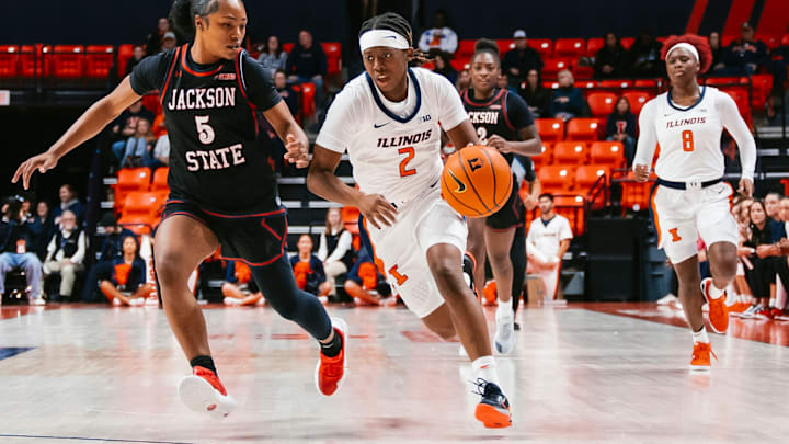 Illinois point guard Destiny Jackson (2) drives on a Jackson State defender in the Illini's 86-43 win Friday at State Farm Center in Champaign, Illinois.