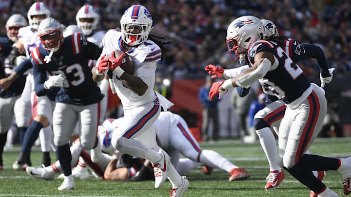 Buffalo Bills running back James Cook runs the ball against the New England Patriots. Buffalo Bills running back James Cook runs the ball against the New England Patriots.