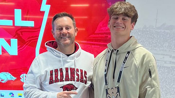 Arkansas Razorbacks coach Ryan SIlverfield (left) with 3-star linebacker Bryce Breeden (right) out of Bridge City, Texas.