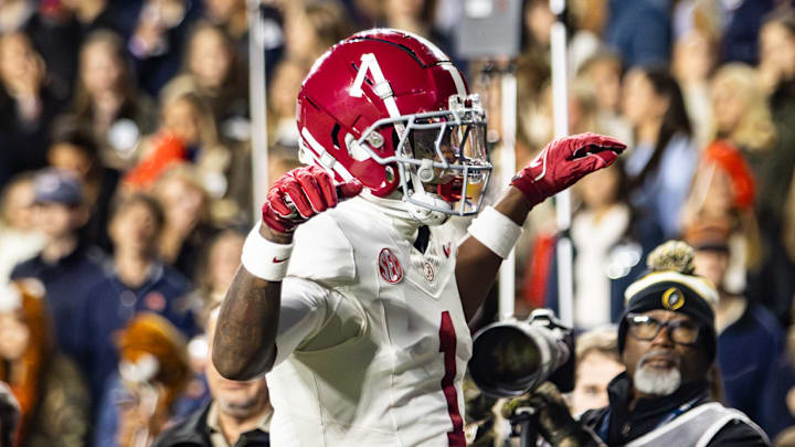Alabama wide receiver Isaiah Horton hits the Crimson Crane after a touchdown in the first half of the Iron Bowl on November 29, 2025.