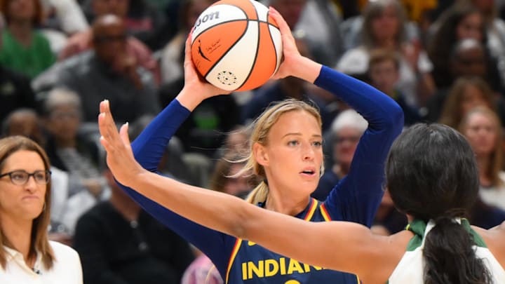 Aug 3, 2025; Seattle, Washington, USA; Indiana Fever guard Sophie Cunningham (8) looks to pass the ball against the Seattle Storm during the first half at Climate Pledge Arena. Mandatory Credit: Steven Bisig-Imagn Images Aug 3, 2025; Seattle, Washington, USA; Indiana Fever guard Sophie Cunningham (8) looks to pass the ball against the Seattle Storm during the first half at Climate Pledge Arena. Mandatory Credit: Steven Bisig-Imagn Images