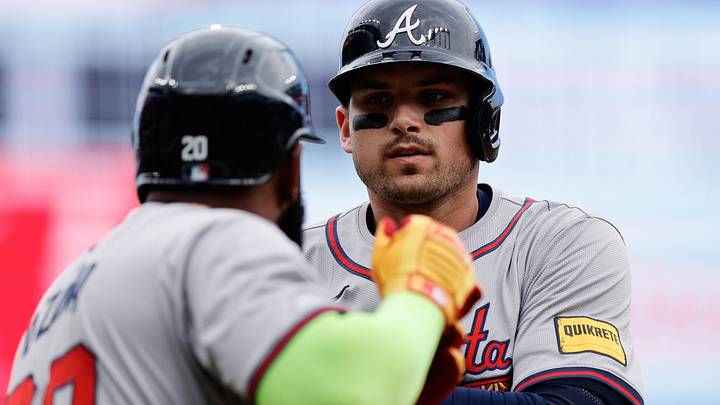 Aug 11, 2024; Denver, Colorado, USA; Atlanta Braves third baseman Austin Riley (27) celebrates his solo home run with designated hitter Marcell Ozuna (20) in the first inning against the Colorado Rockies at Coors Field. Mandatory Credit: Isaiah J. Downing-Imagn Images