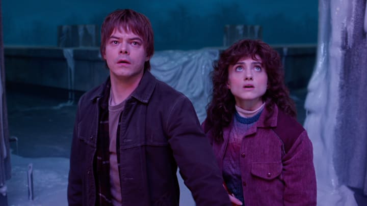 STRANGER THINGS: SEASON 5. (L to R) Charlie Heaton as Jonathan Byers and Natalia Dyer as Nancy Wheeler in Stranger Things: Season 5. 
