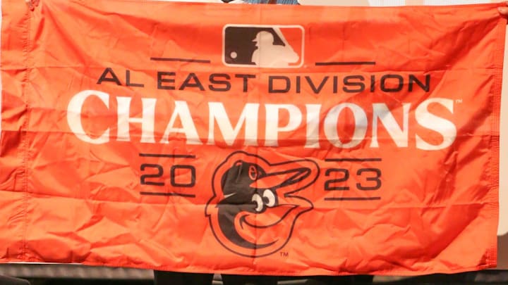 Baltimore Orioles pitching prospect Cade Povich holds a 2023 American League East championship