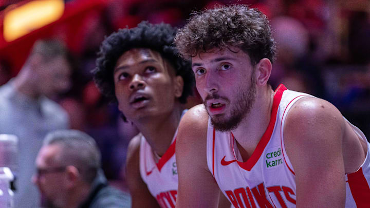 Jan 12, 2024; Detroit, Michigan, USA; Houston Rockets center Alperen Sengun (28) and forward Amen Thompson (1) sit on the sidelines on a play stoppage against the Detroit Pistons during the in the first half at Little Caesars Arena. Mandatory Credit: David Reginek-Imagn Images Jan 12, 2024; Detroit, Michigan, USA; Houston Rockets center Alperen Sengun (28) and forward Amen Thompson (1) sit on the sidelines on a play stoppage against the Detroit Pistons during the in the first half at Little Caesars Arena. Mandatory Credit: David Reginek-Imagn Images