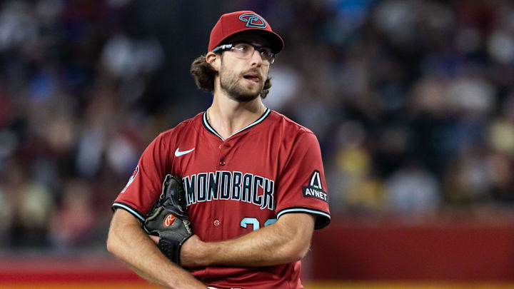 May 28, 2025; Phoenix, Arizona, USA; Arizona Diamondbacks pitcher Zac Gallen reacts in the fifth inning against the Pittsburgh Pirates at Chase Field. Mandatory Credit: Mark J. Rebilas-Imagn Images May 28, 2025; Phoenix, Arizona, USA; Arizona Diamondbacks pitcher Zac Gallen reacts in the fifth inning against the Pittsburgh Pirates at Chase Field. Mandatory Credit: Mark J. Rebilas-Imagn Images