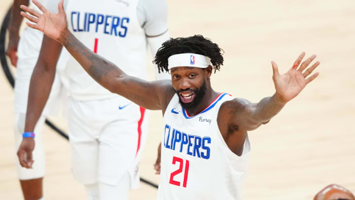 Jun 22, 2021; Phoenix, Arizona, USA; Los Angeles Clippers guard Patrick Beverley (21) reacts against the Phoenix Suns during game two of the Western Conference Finals for the 2021 NBA Playoffs at Phoenix Suns Arena. Mandatory Credit: Mark J. Rebilas-Imagn Images Jun 22, 2021; Phoenix, Arizona, USA; Los Angeles Clippers guard Patrick Beverley (21) reacts against the Phoenix Suns during game two of the Western Conference Finals for the 2021 NBA Playoffs at Phoenix Suns Arena. Mandatory Credit: Mark J. Rebilas-Imagn Images