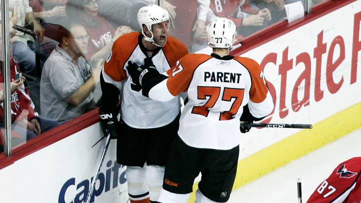 April 11, 2008; Washington, DC, USA; Philadelphia Flyers left wing Vaclav Prospal (40) celebrates his goal with defenseman Ryan Parent (77) as Washington Capitals left wing Donald Brashear (87) skates back to the bench in the second period of the Eastern Conference quarterfinals at the Verizon Center. April 11, 2008; Washington, DC, USA; Philadelphia Flyers left wing Vaclav Prospal (40) celebrates his goal with defenseman Ryan Parent (77) as Washington Capitals left wing Donald Brashear (87) skates back to the bench in the second period of the Eastern Conference quarterfinals at the Verizon Center.