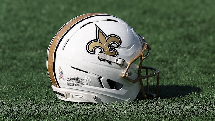 A New Orleans Saints helmet on the ground before a game against the Carolina Panthers on Nov. 9, 2025