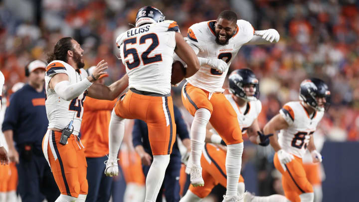 Denver Broncos rookie linebacker Jonah Elliss (52) celebrates a fumble recovery in Sunday night's 27-2 preseason win over the Green Bay Packers. 