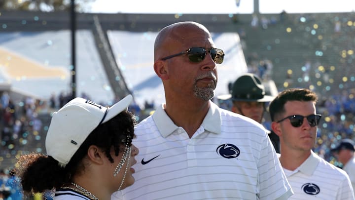 Oct 4, 2025; Pasadena, California, USA;  Penn State Nittany Lions head coach James Franklin (middle) looks on after defeated by UCLA Bruins 42-37 at Rose Bowl. 