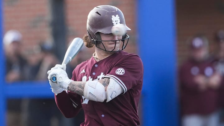 Mississippi State's catcher Ross Highfill (22) leans back to dodge a pitch during the game between Mississippi State and the University of Memphis at FedExPark in Memphis, Tenn., on Tuesday, April 1, 2025. Mississippi State's catcher Ross Highfill (22) leans back to dodge a pitch during the game between Mississippi State and the University of Memphis at FedExPark in Memphis, Tenn., on Tuesday, April 1, 2025.