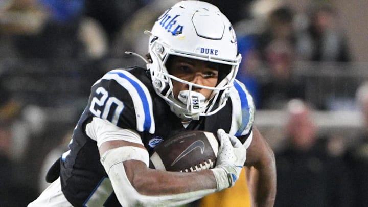 Nov 29, 2025; Durham, North Carolina, USA;  Duke Blue Devils running back Nate Sheppard (20) runs the ball during the fourth quarter against the Wake Forest Demon Deacons at Wallace Wade Stadium. Mandatory Credit: Zachary Taft-Imagn Images