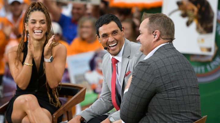 David Pollack shares a laugh with Tennessee Head Coach Josh Heupel and Jess Sims at the ESPN College GameDay stage David Pollack shares a laugh with Tennessee Head Coach Josh Heupel and Jess Sims at the ESPN College GameDay stage
