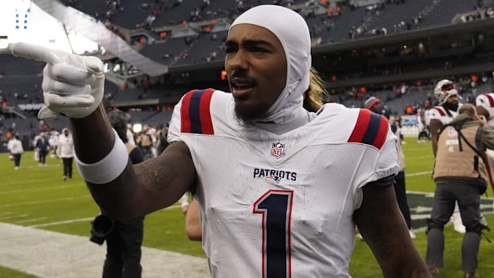 Nov 10, 2024; Chicago, Illinois, USA; New England Patriots wide receiver Ja'Lynn Polk (1) celebrates the win against the Chicago Bears at Soldier Field. Mandatory Credit: David Banks-Imagn Images
