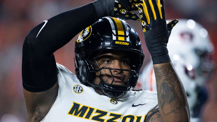 Missouri Tigers defensive tackle Chris McClellan (7) celebrates his sack as Auburn Tigers take on Missouri Tigers at Jordan-Hare Stadium in Auburn, Ala. on Saturday, Oct. 18, 2025. Missouri Tigers lead Auburn Tigers 10-7 at halftime.