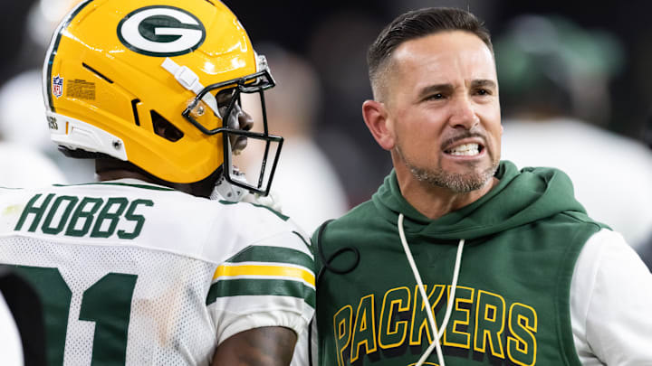 Oct 19, 2025; Glendale, Arizona, USA; Green Bay Packers head coach Matt LaFleur with cornerback Nate Hobbs (21) against the Arizona Cardinals at State Farm Stadium.
