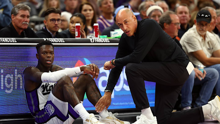 Oct 22, 2025; Phoenix, Arizona, USA; Sacramento Kings guard Dennis Schroder (17) with head coach Doug Christie against the Phoenix Suns at the Mortgage Matchup Center. Mandatory Credit: Mark J. Rebilas-Imagn Images
