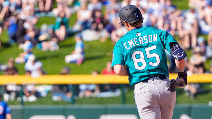 Mar 8, 2025; Mesa, Arizona, USA; Seattle Mariners infielder Colt Emerson (85) hits a home run in the top of the ninth during a spring training game against the Chicago Cubs at Sloan Park. Mandatory Credit: Allan Henry-Imagn Images