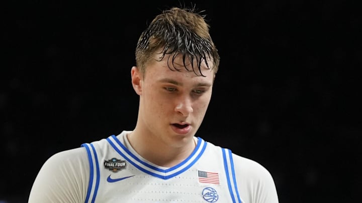 Apr 5, 2025; San Antonio, TX, USA; Duke Blue Devils forward Cooper Flagg (2) walks off the court after losing to the Houston Cougars in the semifinals of the men's Final Four of the 2025 NCAA Tournament at the Alamodome. Mandatory Credit: Robert Deutsch-Imagn Images