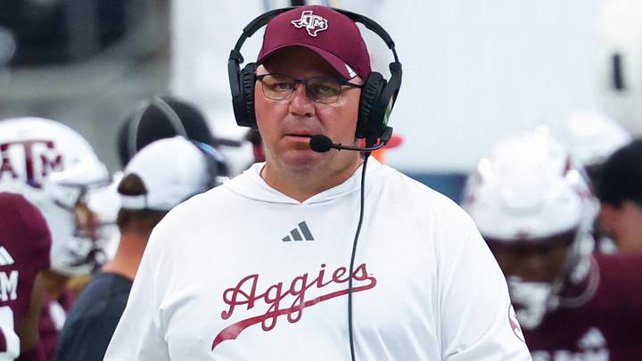 Texas A&M Aggies head coach Mike Elko during the first half against the Arkansas Razorbacks at AT&T Stadium. Texas A&M Aggies head coach Mike Elko during the first half against the Arkansas Razorbacks at AT&T Stadium.